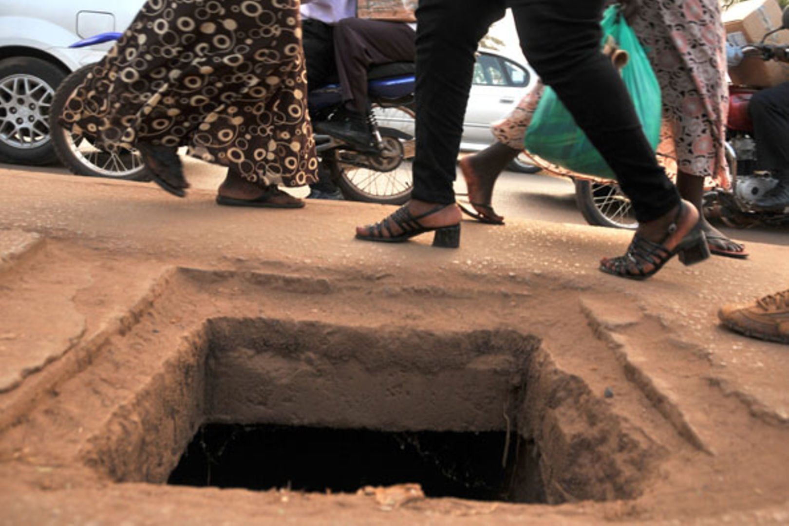 An open manhole on a Kampala Street