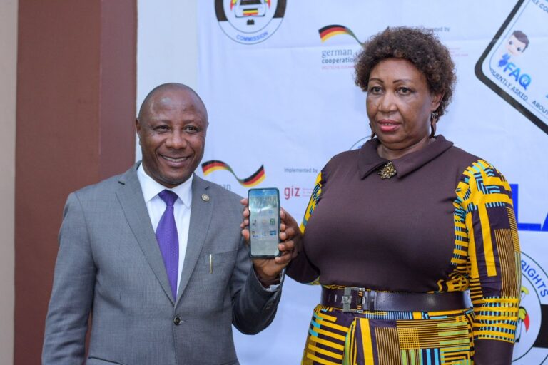 ICT Junior Minister, Hon Kabbyanga Godfrey Baluku (L) and Uganda Human Rights Commission Chair, Mariam Wangadya at the launch of the UHRC App on 24th November, 2022/ Photo: Hon Kabbyanga Godfrey Baluku via twitter.