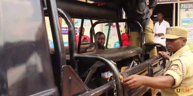 Police transfering the Murder suspect from Herona hospital to Mulago