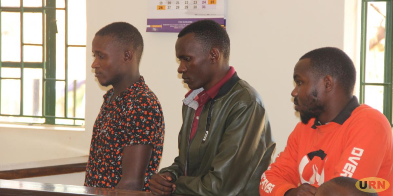 Julius Byamukama, John Tindyebwa and Bernard Tumusiime while appearing before the Hoima Grade one Magistrates court over theft of vehicles.
