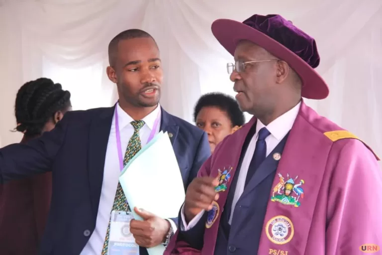 PS Bigirimana Interacts with an official